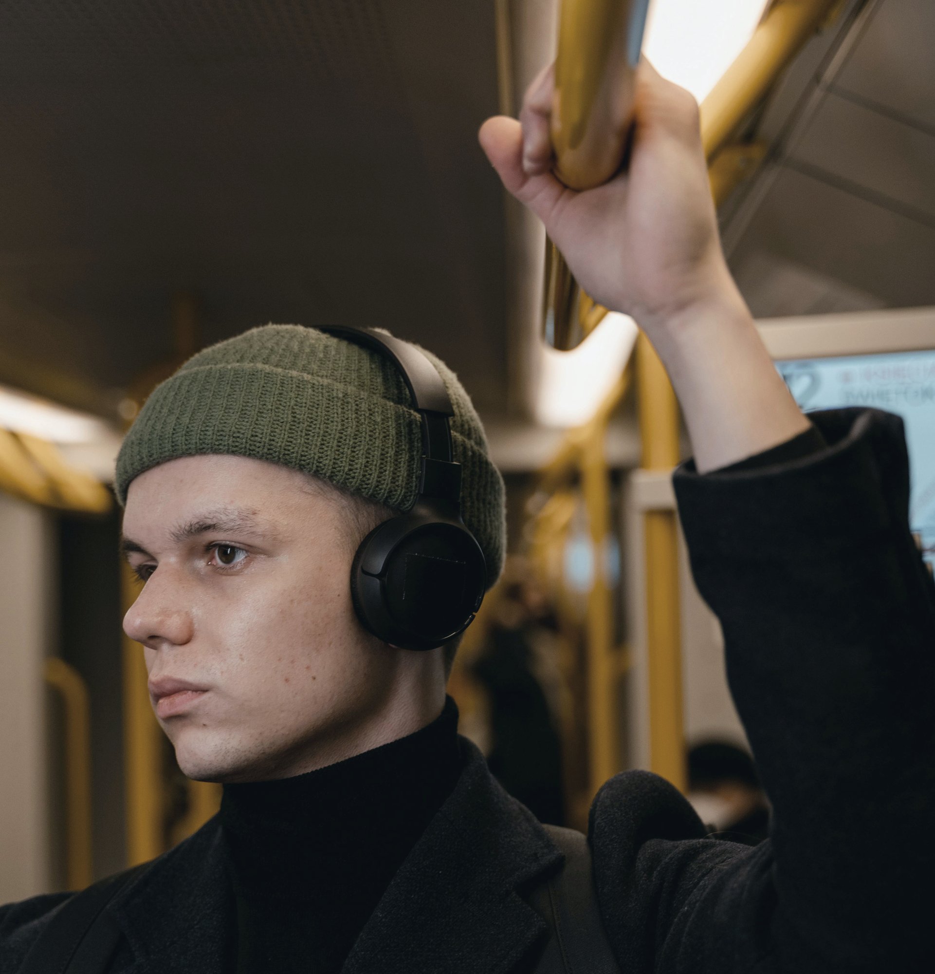 PUB-man-standing-in-bus